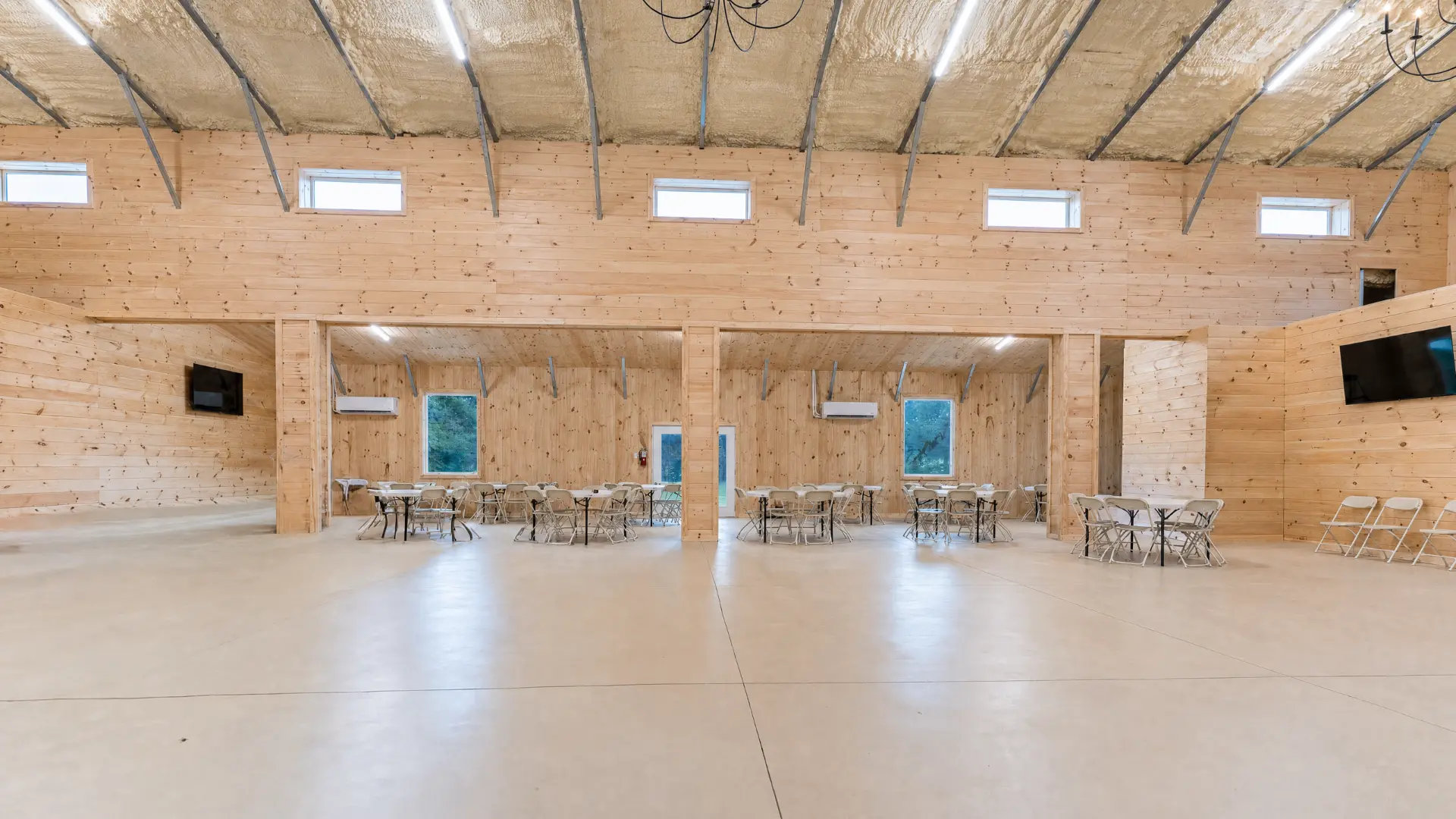 Side alcoves of the event hall with clerestory windows
